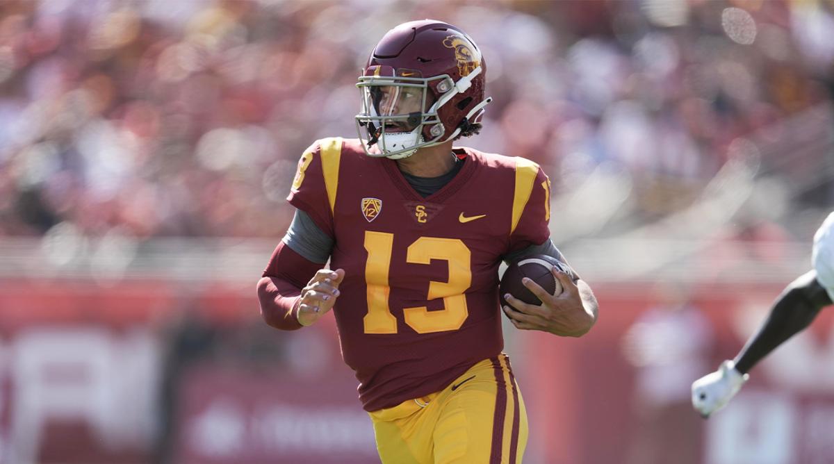 Sep 3, 2022; Los Angeles, California, USA; Southern California Trojans quarterback Caleb Williams (13) carries the ball against the Rice Owls in the first half at United Airlines Field at Los Angeles Memorial Coliseum.